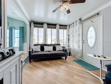 CHARMING MOBILE HOME IN ACTIVE 55+ COMMUNITY! Pride of ownership on River Run Golf Links in Florida - for sale on GolfHomes.com, golf home, golf lot