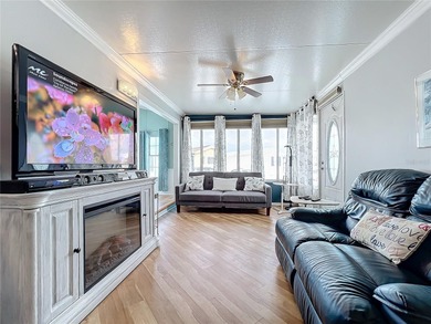 CHARMING MOBILE HOME IN ACTIVE 55+ COMMUNITY! Pride of ownership on River Run Golf Links in Florida - for sale on GolfHomes.com, golf home, golf lot