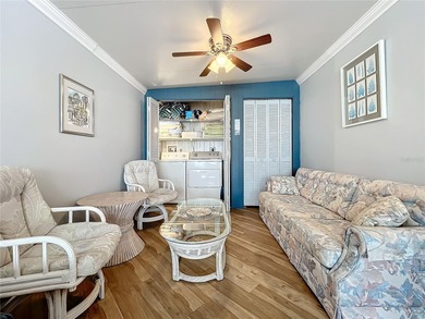 CHARMING MOBILE HOME IN ACTIVE 55+ COMMUNITY! Pride of ownership on River Run Golf Links in Florida - for sale on GolfHomes.com, golf home, golf lot