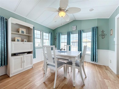 CHARMING MOBILE HOME IN ACTIVE 55+ COMMUNITY! Pride of ownership on River Run Golf Links in Florida - for sale on GolfHomes.com, golf home, golf lot