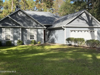 Welcome to your retreat in Boiling Spring Lakes! This home is on The Lakes Country Club in North Carolina - for sale on GolfHomes.com, golf home, golf lot