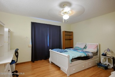 Spacious 4 - bedroom home on golf course with cozy fireplace is on Rockledge Country Club in Florida - for sale on GolfHomes.com, golf home, golf lot