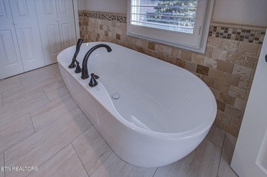 Wake up to sweeping, expansive panoramic views of Tellico Lake on Toqua Golf Course - Loudon County in Tennessee - for sale on GolfHomes.com, golf home, golf lot