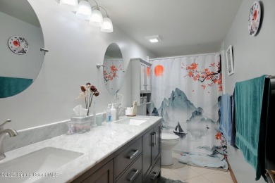 Spacious 4 - bedroom home on golf course with cozy fireplace is on Rockledge Country Club in Florida - for sale on GolfHomes.com, golf home, golf lot