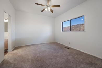 Discover the charm of this 2-bedroom, 2-bathroom condo, situated on Dixie Red Hills Golf Course in Utah - for sale on GolfHomes.com, golf home, golf lot