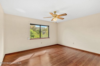 Spacious 4 - bedroom home on golf course with cozy fireplace is on Rockledge Country Club in Florida - for sale on GolfHomes.com, golf home, golf lot