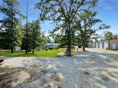 Discover 24960 McClurg Dr, home to Midnight Acres Kennel, an on Lebanon Community Golf and Country Club in Missouri - for sale on GolfHomes.com, golf home, golf lot