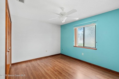 Spacious 4 - bedroom home on golf course with cozy fireplace is on Rockledge Country Club in Florida - for sale on GolfHomes.com, golf home, golf lot