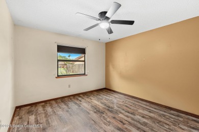 Spacious 4 - bedroom home on golf course with cozy fireplace is on Rockledge Country Club in Florida - for sale on GolfHomes.com, golf home, golf lot