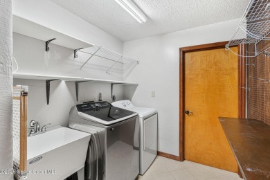 Spacious 4 - bedroom home on golf course with cozy fireplace is on Rockledge Country Club in Florida - for sale on GolfHomes.com, golf home, golf lot