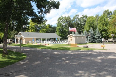 Beautiful Corner Lot includes shed & 2023 Salem Grand Villa 42 on Marquette Trails Country Club in Michigan - for sale on GolfHomes.com, golf home, golf lot