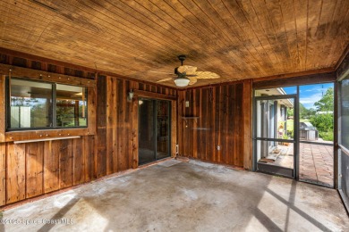 Spacious 4 - bedroom home on golf course with cozy fireplace is on Rockledge Country Club in Florida - for sale on GolfHomes.com, golf home, golf lot