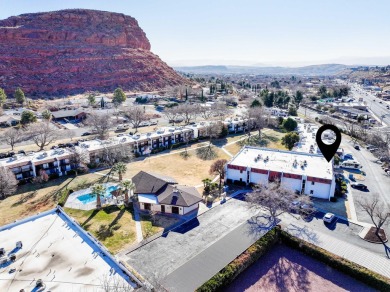 Discover the charm of this 2-bedroom, 2-bathroom condo, situated on Dixie Red Hills Golf Course in Utah - for sale on GolfHomes.com, golf home, golf lot