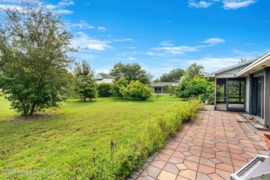 Spacious 4 - bedroom home on golf course with cozy fireplace is on Rockledge Country Club in Florida - for sale on GolfHomes.com, golf home, golf lot