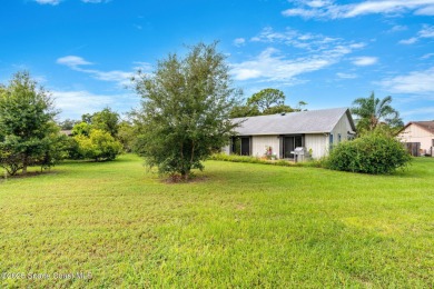 Spacious 4 - bedroom home on golf course with cozy fireplace is on Rockledge Country Club in Florida - for sale on GolfHomes.com, golf home, golf lot
