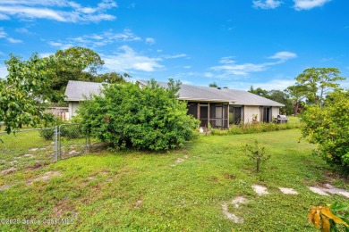 Spacious 4 - bedroom home on golf course with cozy fireplace is on Rockledge Country Club in Florida - for sale on GolfHomes.com, golf home, golf lot