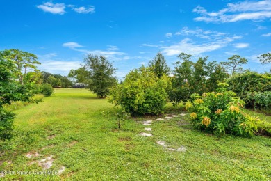 Spacious 4 - bedroom home on golf course with cozy fireplace is on Rockledge Country Club in Florida - for sale on GolfHomes.com, golf home, golf lot