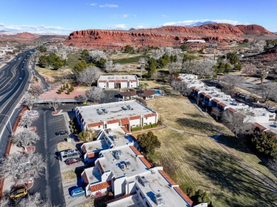 Discover the charm of this 2-bedroom, 2-bathroom condo, situated on Dixie Red Hills Golf Course in Utah - for sale on GolfHomes.com, golf home, golf lot