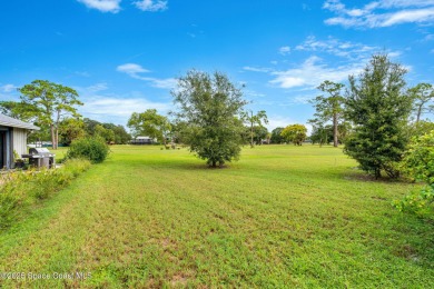 Spacious 4 - bedroom home on golf course with cozy fireplace is on Rockledge Country Club in Florida - for sale on GolfHomes.com, golf home, golf lot