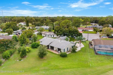 Spacious 4 - bedroom home on golf course with cozy fireplace is on Rockledge Country Club in Florida - for sale on GolfHomes.com, golf home, golf lot