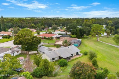 Spacious 4 - bedroom home on golf course with cozy fireplace is on Rockledge Country Club in Florida - for sale on GolfHomes.com, golf home, golf lot