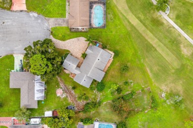 Spacious 4 - bedroom home on golf course with cozy fireplace is on Rockledge Country Club in Florida - for sale on GolfHomes.com, golf home, golf lot