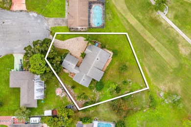 Spacious 4 - bedroom home on golf course with cozy fireplace is on Rockledge Country Club in Florida - for sale on GolfHomes.com, golf home, golf lot