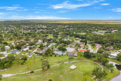 Spacious 4 - bedroom home on golf course with cozy fireplace is on Rockledge Country Club in Florida - for sale on GolfHomes.com, golf home, golf lot