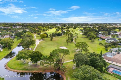 Spacious 4 - bedroom home on golf course with cozy fireplace is on Rockledge Country Club in Florida - for sale on GolfHomes.com, golf home, golf lot