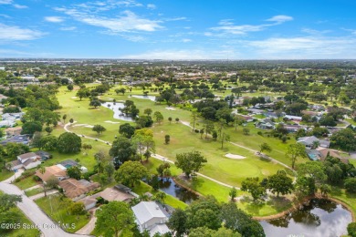 Spacious 4 - bedroom home on golf course with cozy fireplace is on Rockledge Country Club in Florida - for sale on GolfHomes.com, golf home, golf lot
