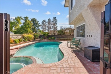 Discover this exceptional pool home located on a tree-lined on Vista Valencia Golf Course in California - for sale on GolfHomes.com, golf home, golf lot