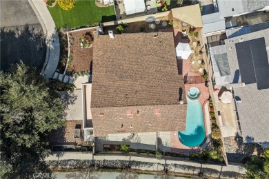 Discover this exceptional pool home located on a tree-lined on Vista Valencia Golf Course in California - for sale on GolfHomes.com, golf home, golf lot