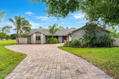Spacious 4 - bedroom home on golf course with cozy fireplace is on Rockledge Country Club in Florida - for sale on GolfHomes.com, golf home, golf lot