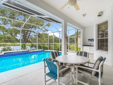 Make this home your own Florida Paradise - Enjoy, a HEATED on Meadow Oaks Golf and Country Club in Florida - for sale on GolfHomes.com, golf home, golf lot