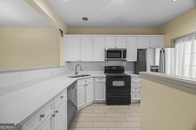 Charming  2-story townhome located in Little Suwanee Pointe on Collins Hill Golf Club in Georgia - for sale on GolfHomes.com, golf home, golf lot