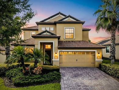 Welcome to 8920 Dove Valley Way, a spacious five-bedroom on The Oasis Club at Champions Gate in Florida - for sale on GolfHomes.com, golf home, golf lot