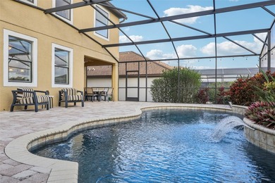 Welcome to 8920 Dove Valley Way, a spacious five-bedroom on The Oasis Club at Champions Gate in Florida - for sale on GolfHomes.com, golf home, golf lot