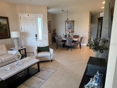 This fabulous and updated villa on the 10th hole overlooking the on Kings Gate Golf Club in Florida - for sale on GolfHomes.com, golf home, golf lot
