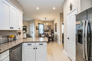 This fabulous and updated villa on the 10th hole overlooking the on Kings Gate Golf Club in Florida - for sale on GolfHomes.com, golf home, golf lot