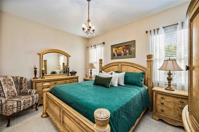 This fabulous and updated villa on the 10th hole overlooking the on Kings Gate Golf Club in Florida - for sale on GolfHomes.com, golf home, golf lot
