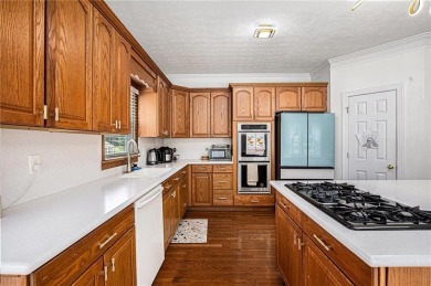 Discover your perfect retreat in this beautiful 4-bedroom, 3 on Canongate On White Oak Golf Course in Georgia - for sale on GolfHomes.com, golf home, golf lot
