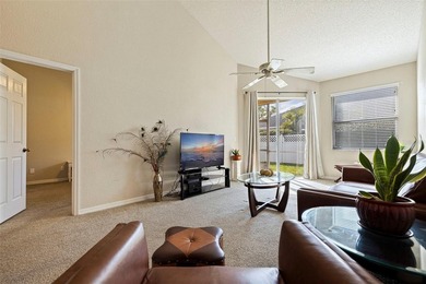 Enjoy maintenance-free Florida living in the highly sought-after on East Bay Golf Club in Florida - for sale on GolfHomes.com, golf home, golf lot