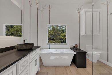 Indulge in the ultimate luxury lifestyle in this unique, custom on Lakeside Village Golf Course in Texas - for sale on GolfHomes.com, golf home, golf lot