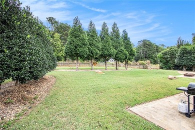 Discover your perfect retreat in this beautiful 4-bedroom, 3 on Canongate On White Oak Golf Course in Georgia - for sale on GolfHomes.com, golf home, golf lot