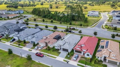 Captivating custom-built pool home, completed in 2023, nestled on Providence Golf Club in Florida - for sale on GolfHomes.com, golf home, golf lot