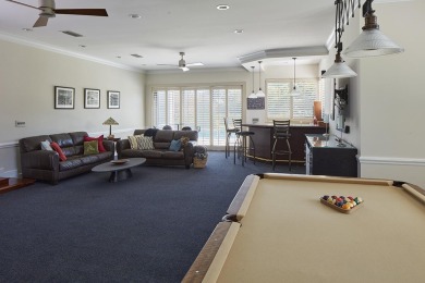 This stunning home sits on almost an acre in the estate section on Pine Tree Golf Club in Florida - for sale on GolfHomes.com, golf home, golf lot