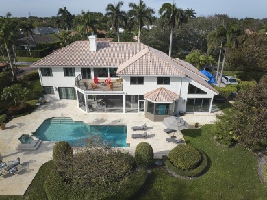 This stunning home sits on almost an acre in the estate section on Pine Tree Golf Club in Florida - for sale on GolfHomes.com, golf home, golf lot