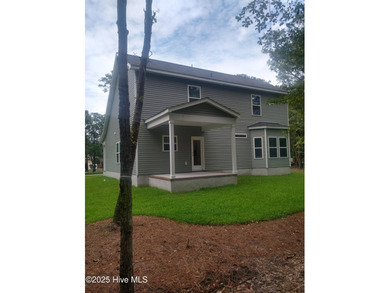 Please note: updated pictures coming soon. Interior photos are on Harbour Point Golf Club in North Carolina - for sale on GolfHomes.com, golf home, golf lot