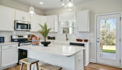 Please note: updated pictures coming soon. Interior photos are on Harbour Point Golf Club in North Carolina - for sale on GolfHomes.com, golf home, golf lot