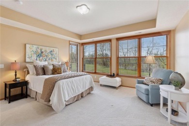 Spacious two-bedroom, two bathroom condo has walls of windows in on The Chaska Par 30 Golf Course in Minnesota - for sale on GolfHomes.com, golf home, golf lot